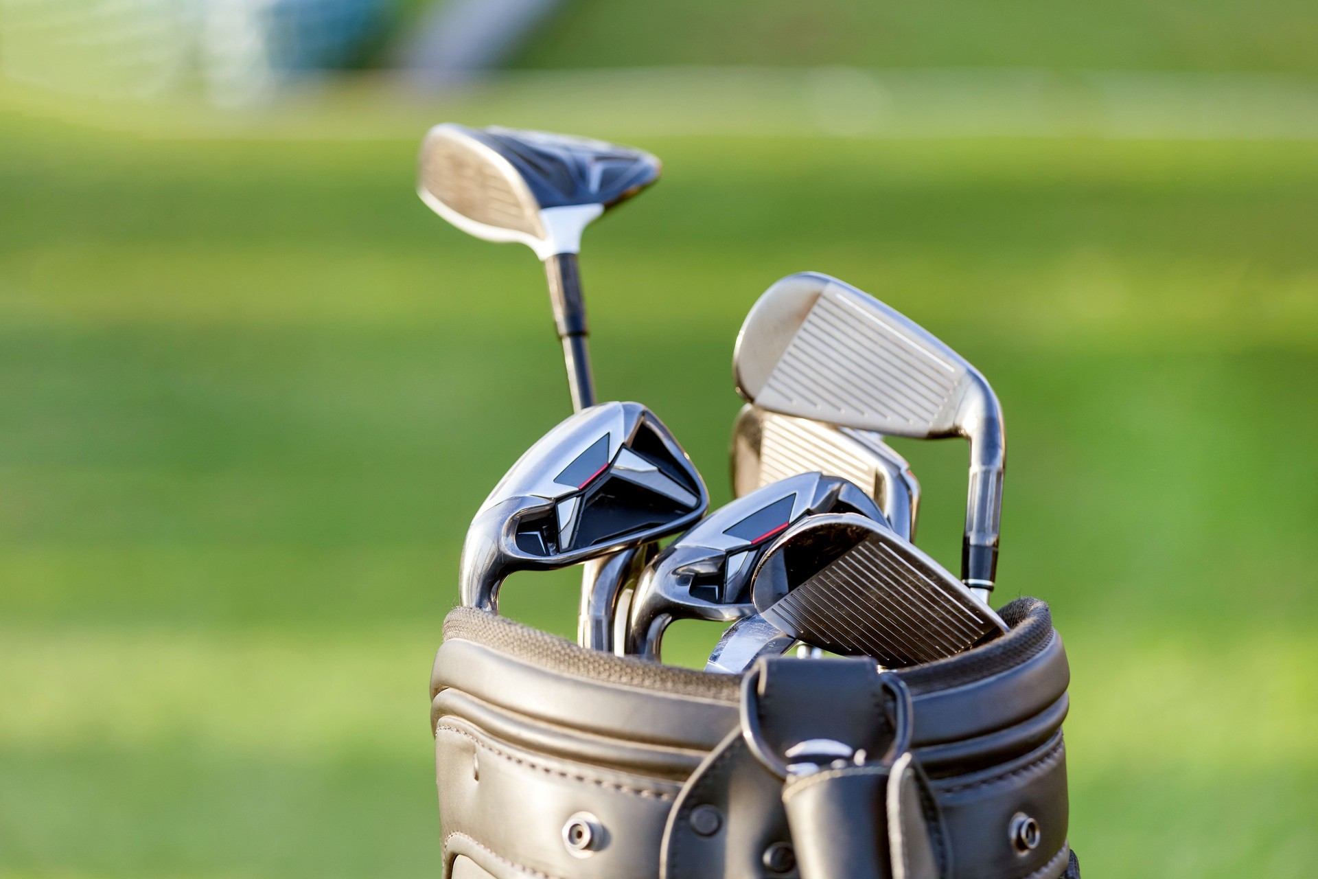 Golf clubs at the golf course, closeup
